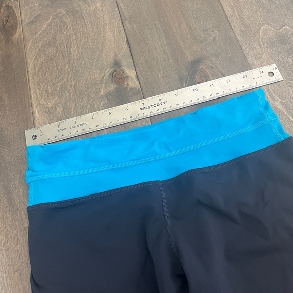 Lululemon Navy with Blue Band and back Pocket Crop Leggings - Picture 2 of 7